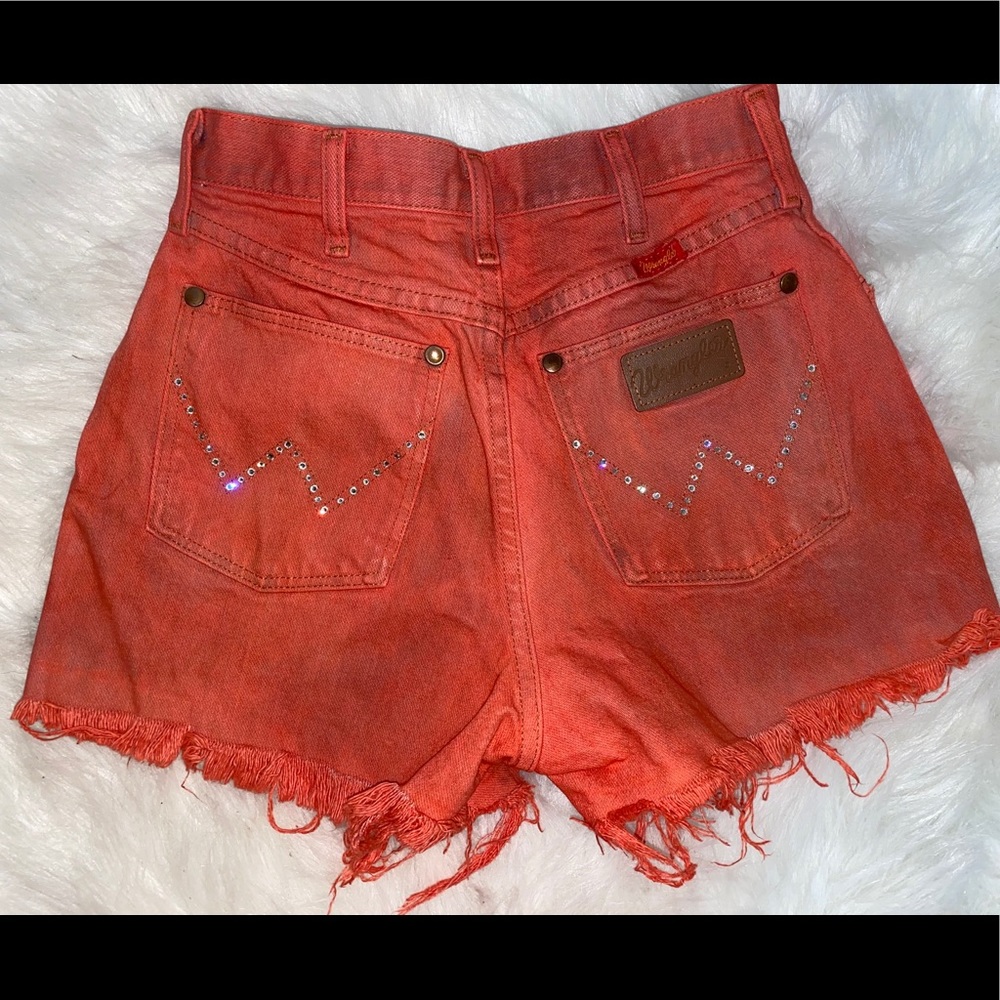 Orange/red Wranglers with rhinestone details